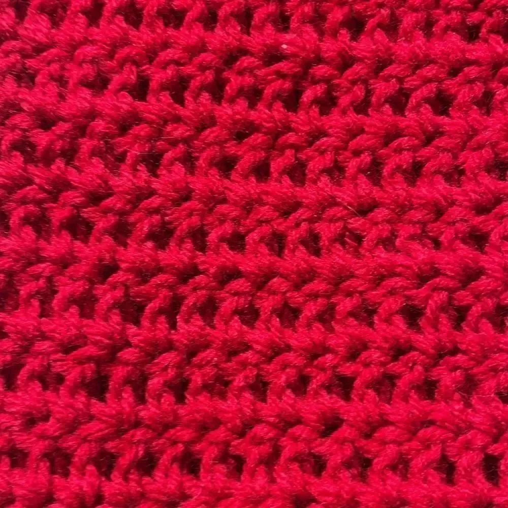 Hand knitted bottle cover